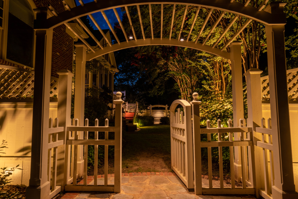 alt="softly lit courtyard with low lumen landscape lighting,by lite visions Raleigh NC"